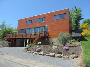 Гостиница Lovely modern cottage with sauna bubble baths and even a beach on the river  Гран-Аллё